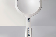 Opticlux-Handheld-with-Charging-Station-background